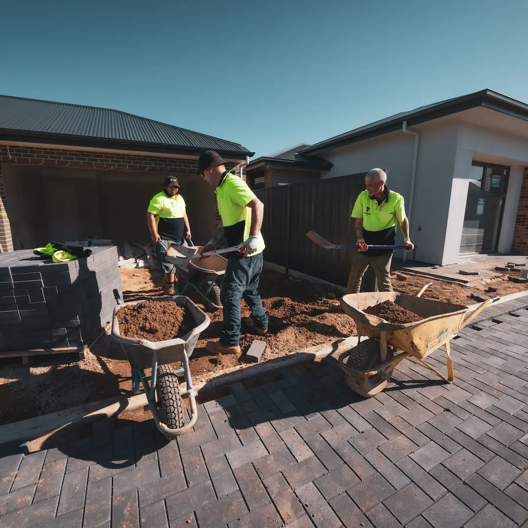 Three tradesman working on a paving project in Adelaide