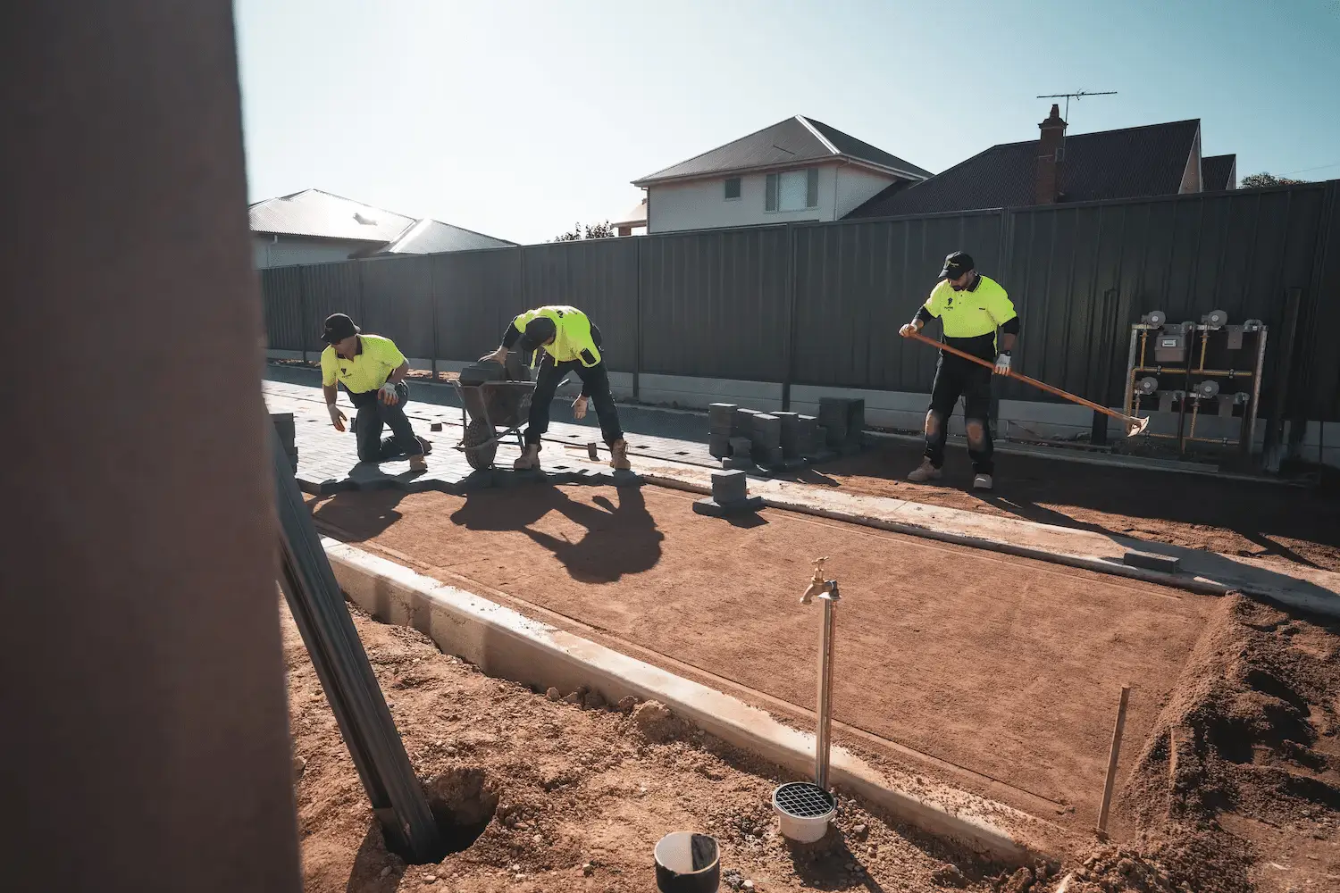 group of paving contractors prepping a driveway in adelaide